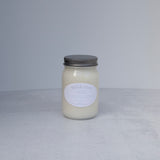 Large candle on a light background
